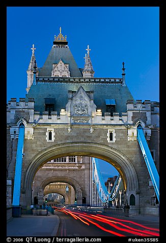 Traffic light trails on Tower Bridge, dusk. London, England, United Kingdom (color)