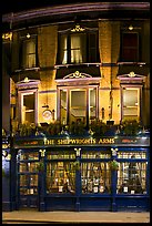 Building housing the pub Shipwrights Arms at night. London, England, United Kingdom (color)