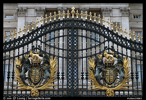Entrance grids of Buckingham Palace with royalty emblems. London, England, United Kingdom (color)