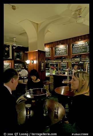 Talking around a drink in the pub Westmister Arms. London, England, United Kingdom (color)