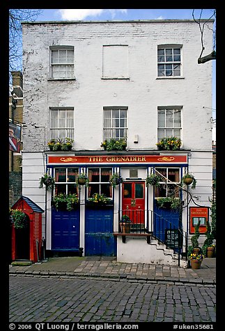 Pub the Grenadier, and cobblestone mews. London, England, United Kingdom