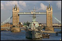 HMS Belfast cruiser and Tower Bridge, late afternoon. London, England, United Kingdom