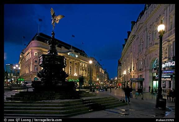 Eros statue and streets at dusk, Picadilly Circus. London, England, United Kingdom