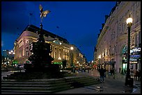 Eros statue and streets at dusk, Picadilly Circus. London, England, United Kingdom