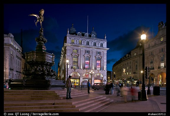 Piccadilly Circus and Eros statue at night. London, England, United Kingdom