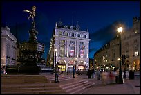 Piccadilly Circus and Eros statue at night. London, England, United Kingdom