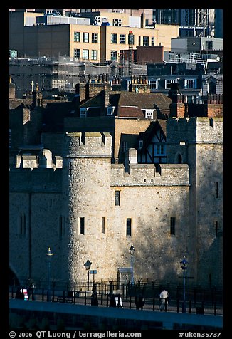 Tower of London and jumble of modern buildings in the background. London, England, United Kingdom