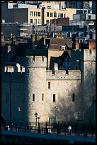 Tower of London and jumble of modern buildings in the background. London, England, United Kingdom ( color)