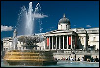 Fountain and National Gallery, Trafalgar Square, mid-day. London, England, United Kingdom