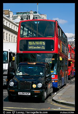 Taxi and double decker bus. London, England, United Kingdom