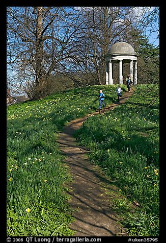 Children running down a trail leading to gazebo. Kew Royal Botanical Gardens,  London, England, United Kingdom (color)
