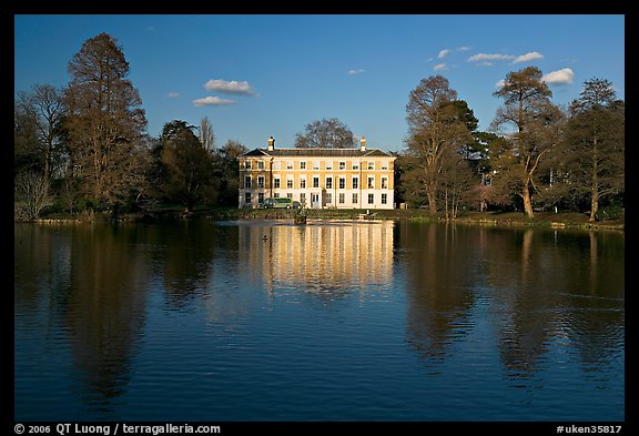 Museum No 1 reflected in lake, late afternoon. Kew Royal Botanical Gardens,  London, England, United Kingdom (color)