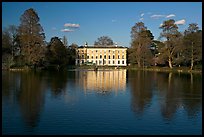 Museum No 1 reflected in lake, late afternoon. Kew Royal Botanical Gardens,  London, England, United Kingdom