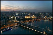 Aerial view of Charing Cross Station, Hungerford Bridge and Golden Jubilee Bridges at sunset. London, England, United Kingdom