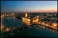 Aerial view of Thames River, Westmister Bridge and Palace at dusk. London, England, United Kingdom ( color)