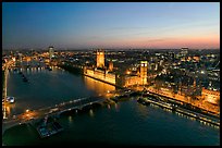 Aerial view of Thames River, Westmister Bridge and Palace at dusk. London, England, United Kingdom