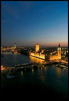 Aerial view of Thames River and Houses of Parliament at dusk. London, England, United Kingdom (color)