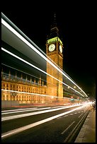 Lights from a moving bus, Houses of Parliament, and Big Ben at night. London, England, United Kingdom