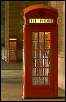 Red phone booth at night. London, England, United Kingdom