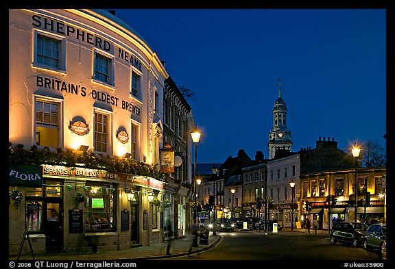 Tavern, street, and church at night. Greenwich, London, England, United Kingdom