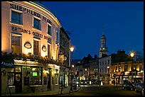 Tavern, street, and church at night. Greenwich, London, England, United Kingdom