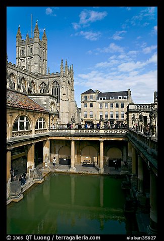 Great Bath Roman building, with Abbey in background. Bath, Somerset, England, United Kingdom (color)