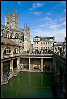 Great Bath Roman building, with Abbey in background. Bath, Somerset, England, United Kingdom