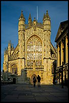 West facade of Bath Abbey with couple silhouette, late afternoon. Bath, Somerset, England, United Kingdom (color)