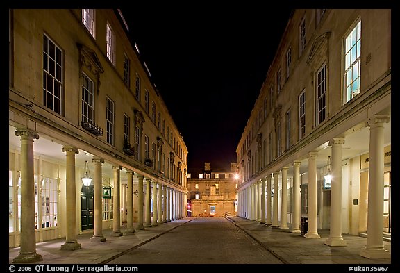 Street bordered by colonades at night. Bath, Somerset, England, United Kingdom (color)