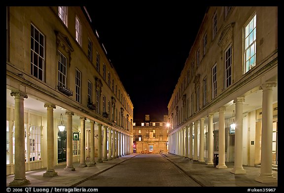 Street bordered by colonades at night. Bath, Somerset, England, United Kingdom