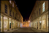 Street bordered by colonades at night. Bath, Somerset, England, United Kingdom ( color)