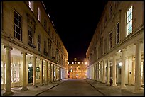 Street bordered by colonades at night. Bath, Somerset, England, United Kingdom (color)