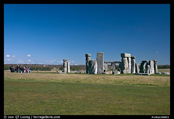 Large group of tourists looking at the megaliths, Stonehenge, Salisbury. England, United Kingdom (color)