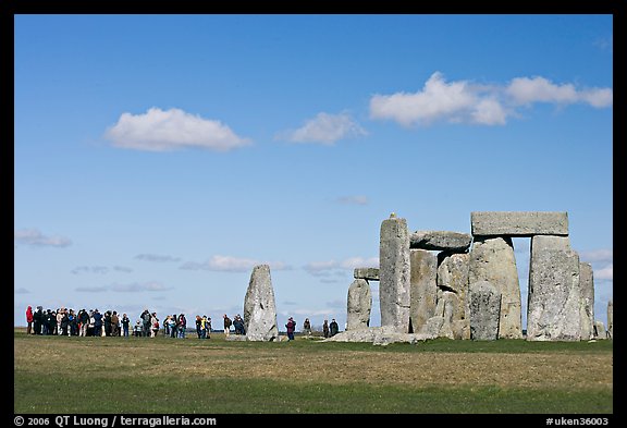 Large group of tourists looking at the standing stones, Stonehenge, Salisbury. England, United Kingdom