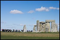 Large group of tourists looking at the standing stones, Stonehenge, Salisbury. England, United Kingdom