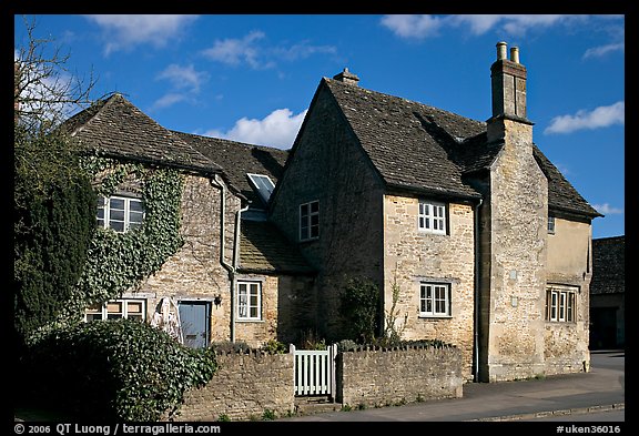 Houses with roofs made from split natural stone tiles, Lacock. Wiltshire, England, United Kingdom (color)