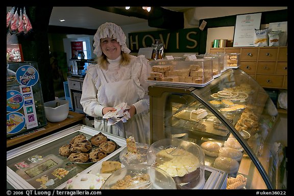 Baker wearing old-fashioned attire, Lacock. Wiltshire, England, United Kingdom (color)