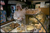 Baker wearing old-fashioned attire, Lacock. Wiltshire, England, United Kingdom ( color)