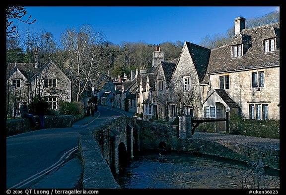 Packbridge crossing the Bybrook River and main street, Castle Combe. Wiltshire, England, United Kingdom