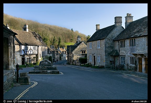 Main village street,  half timbered Court House, and Butter Cross, Castle Combe. Wiltshire, England, United Kingdom