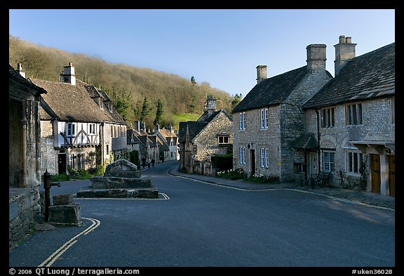 Main village street,  half timbered Court House, and Butter Cross, Castle Combe. Wiltshire, England, United Kingdom