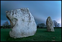 Large standing stones and brewing storm at dusk, Avebury, Wiltshire. England, United Kingdom (color)