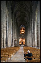 Man sitting in the Nave of the Canterbury Cathedral. Canterbury,  Kent, England, United Kingdom (color)