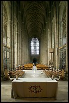 Altar, soaring arches of the Nave, and stained glass, Canterbury Cathedral. Canterbury,  Kent, England, United Kingdom