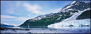 Landscape with tidewater glacier and waterfall. Prince William Sound, Alaska, USA (Panoramic color)