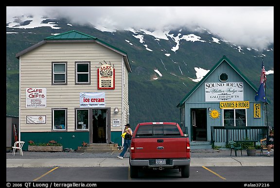 Cabins on the waterfront and red truck. Whittier, Alaska, USA