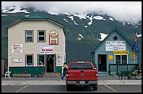 Cabins on the waterfront and red truck. Whittier, Alaska, USA