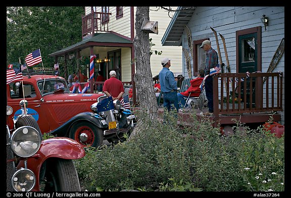 Vintage cars and houses on main street. McCarthy, Alaska, USA (color)