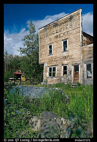 Weathered facade of old hardware store. McCarthy, Alaska, USA (color)