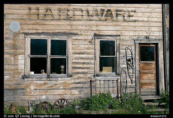 Windows and doors of old hardware store. McCarthy, Alaska, USA
